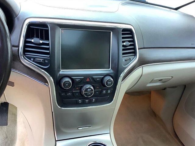 Photo of 2014 Deep Cherry Red Crystal Pearlcoat Jeep Grand Cherokee