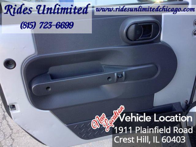 Photo of 2009 Bright Silver Metallic Clear Coat Jeep Wrangler Unlimited