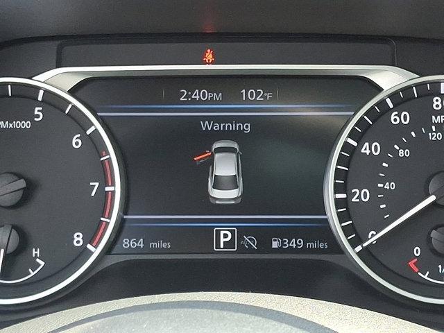 Photo of 2024 Aspen White Tricoat Nissan Sentra