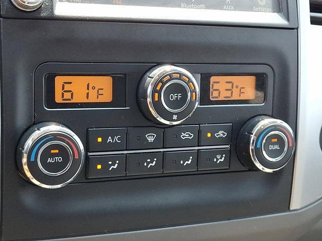 Photo of 2021 Magnetic Black Pearl Nissan Frontier