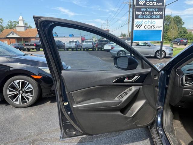 Photo of 2014 Blue Reflex Mica Mazda Mazda3