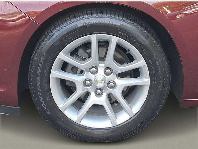 Photo of 2015 Butte Red Metallic Chevrolet Malibu