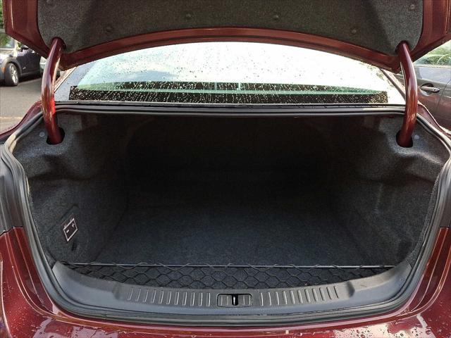 Photo of 2015 Butte Red Metallic Chevrolet Malibu