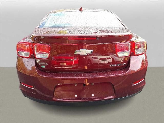 Photo of 2015 Butte Red Metallic Chevrolet Malibu