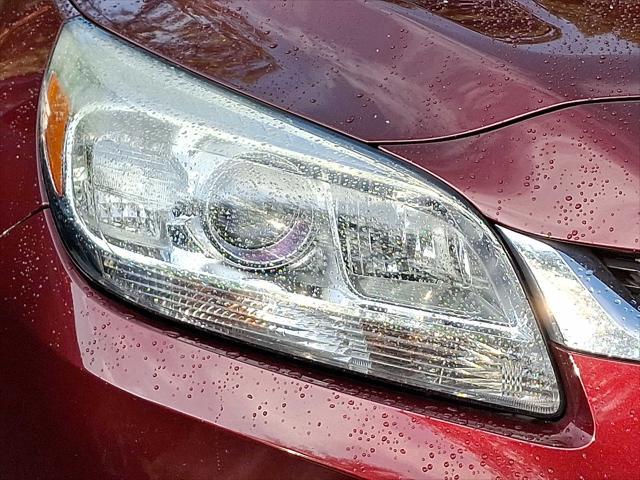 Photo of 2015 Butte Red Metallic Chevrolet Malibu