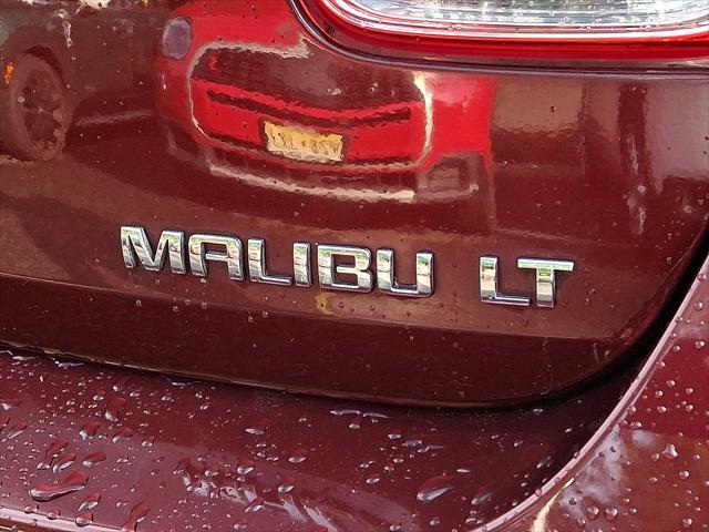 Photo of 2015 Butte Red Metallic Chevrolet Malibu