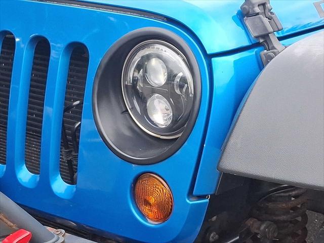 Photo of 2015 Hydro Blue Pearl Coat Jeep Wrangler Unlimited
