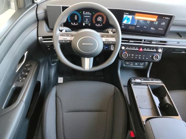 Photo of 2025 White Pearl Hyundai TUCSON Hybrid