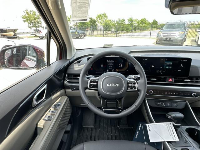 Photo of 2025 Flare Red Kia Carnival