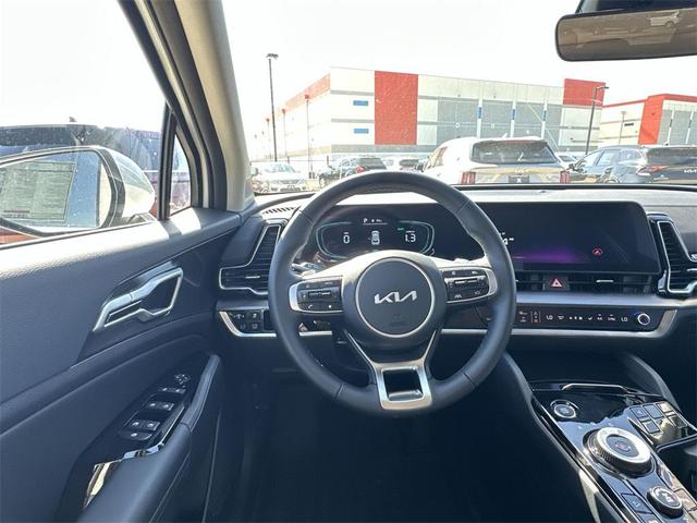Photo of 2025 Snow White Pearl Kia Sportage Hybrid