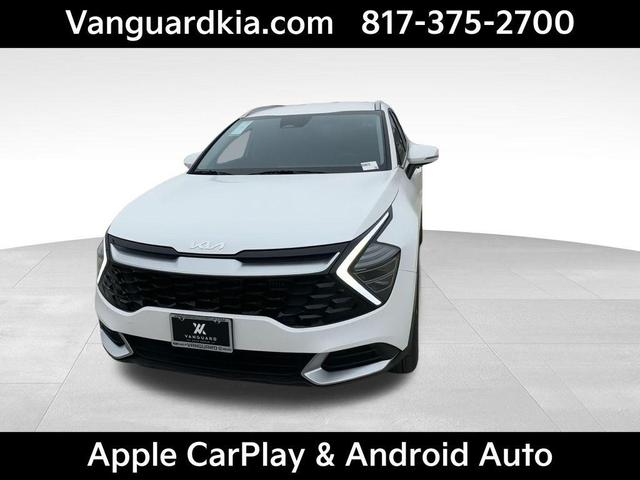 Photo of 2025 Snow White Pearl Kia Sportage Hybrid