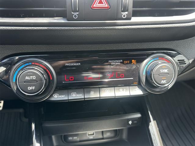 Photo of 2024 Currant Red Kia Forte