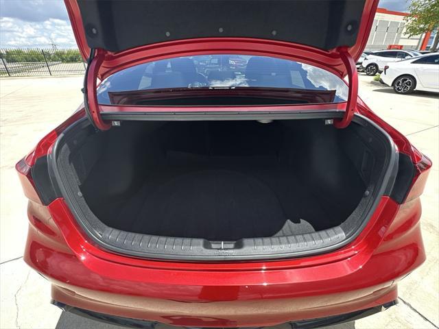 Photo of 2024 Currant Red Kia Forte