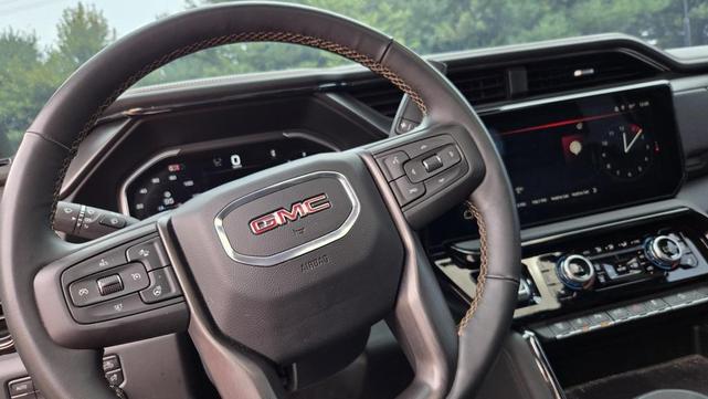 Photo of 2024 Volcanic Red Tintcoat GMC Sierra 2500