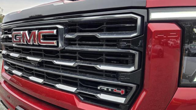 Photo of 2024 Volcanic Red Tintcoat GMC Sierra 2500