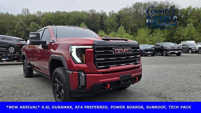 Photo of 2024 Volcanic Red Tintcoat GMC Sierra 2500