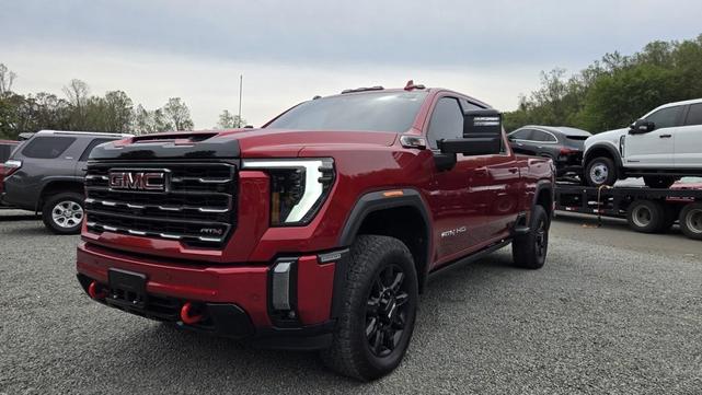 Photo of 2024 Volcanic Red Tintcoat GMC Sierra 2500