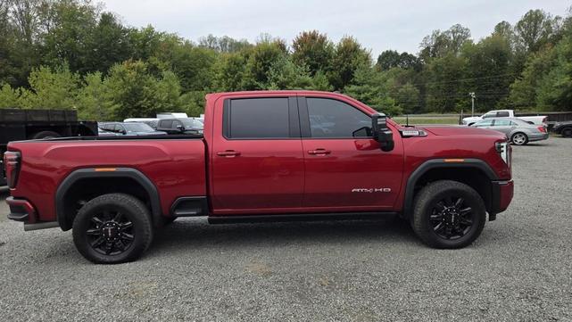 Photo of 2024 Volcanic Red Tintcoat GMC Sierra 2500
