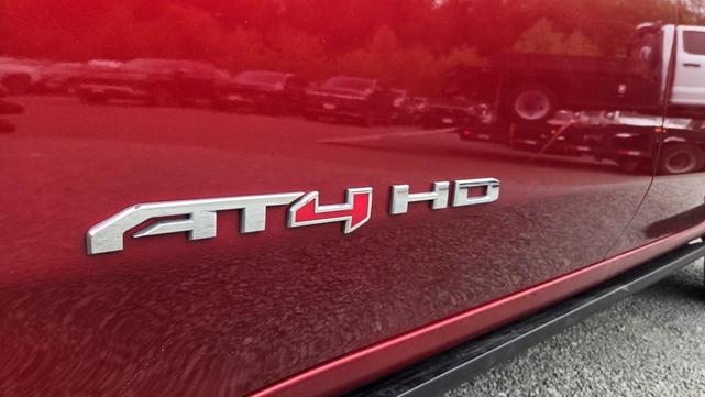 Photo of 2024 Volcanic Red Tintcoat GMC Sierra 2500