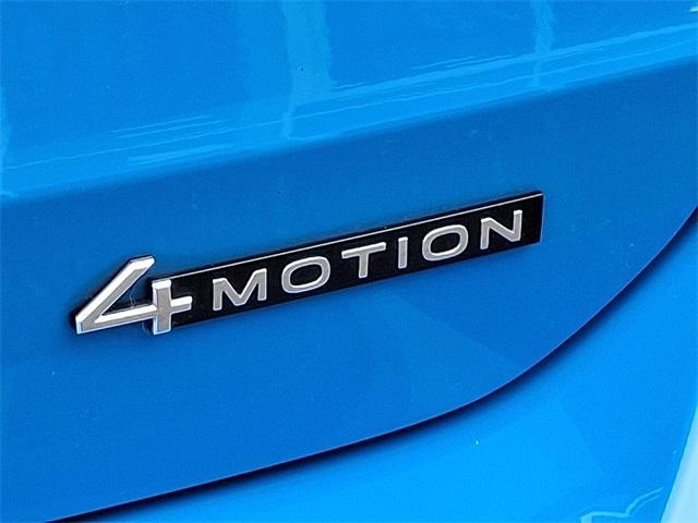 Photo of 2022 Cornflower Blue Volkswagen Taos