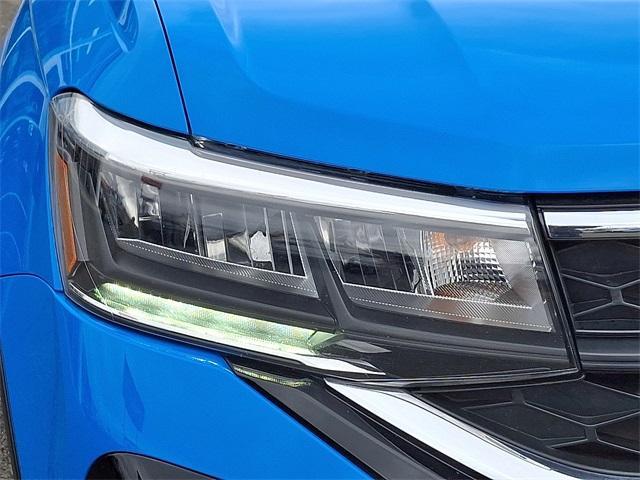 Photo of 2022 Cornflower Blue Volkswagen Taos