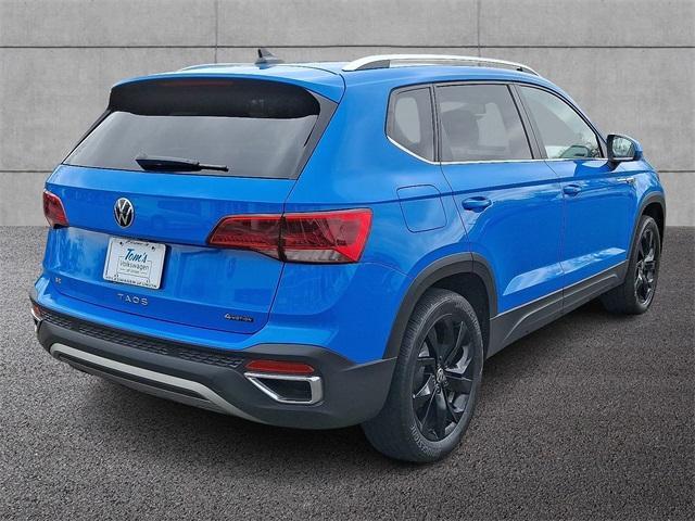 Photo of 2022 Cornflower Blue Volkswagen Taos