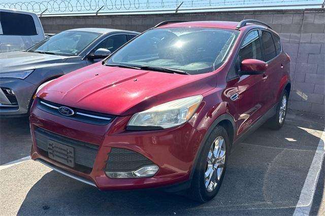 Photo of 2016 Ruby Red Metallic Ford Escape