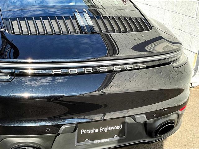 Photo of 2023 Jet Black Metallic Porsche 911