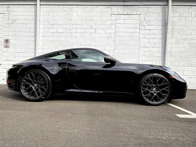 Photo of 2023 Jet Black Metallic Porsche 911