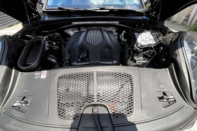 Photo of 2025 Jet Black Metallic Porsche Macan