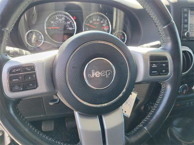 Photo of 2015 Bright White Clearcoat Jeep Wrangler Unlimited