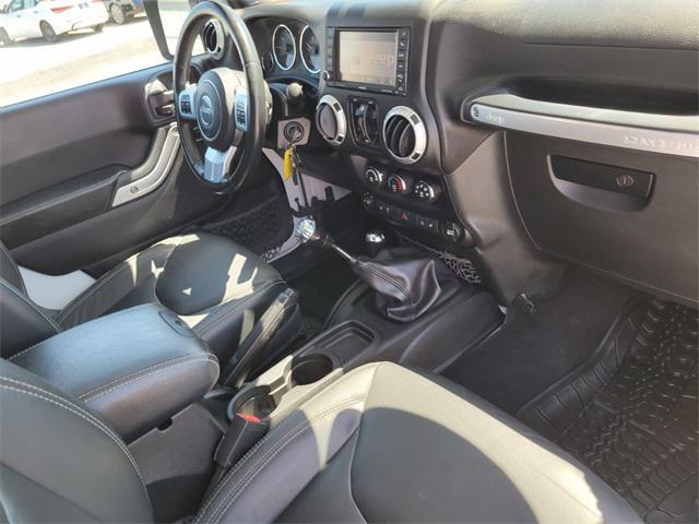 Photo of 2015 Bright White Clearcoat Jeep Wrangler Unlimited