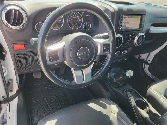 Photo of 2015 Bright White Clearcoat Jeep Wrangler Unlimited