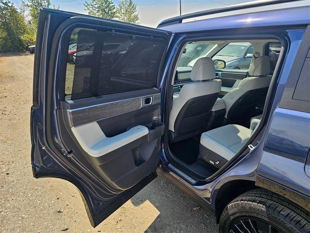 Photo of 2025 Atlantis Blue Hyundai SANTA FE HEV
