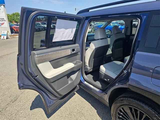 Photo of 2025 Atlantis Blue Hyundai SANTA FE HEV