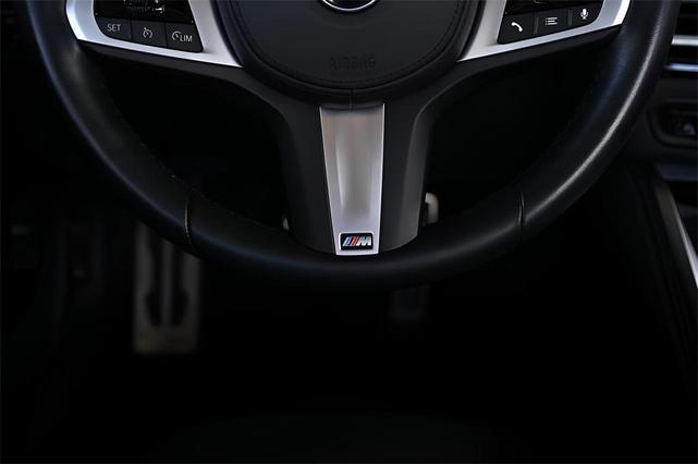 Photo of 2024 Black Sapphire Metallic BMW M440