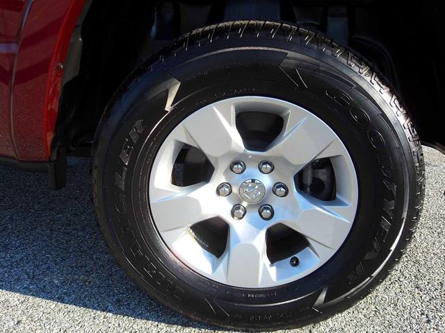 Photo of 2025 Delmonico Red Pearlcoat RAM 1500