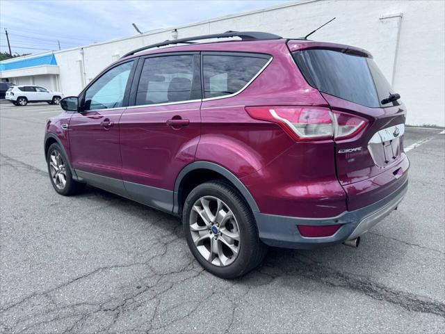 Photo of 2013 Ruby Red Tinted Clearcoat Ford Escape