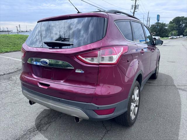 Photo of 2013 Ruby Red Tinted Clearcoat Ford Escape