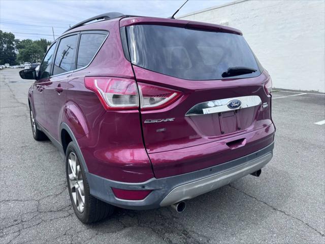 Photo of 2013 Ruby Red Tinted Clearcoat Ford Escape