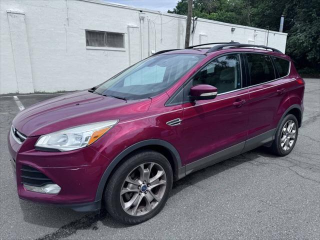 Photo of 2013 Ruby Red Tinted Clearcoat Ford Escape