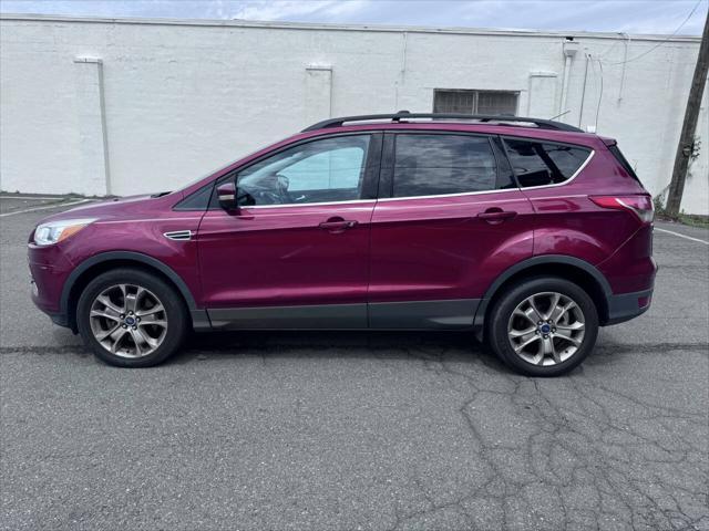 Photo of 2013 Ruby Red Tinted Clearcoat Ford Escape