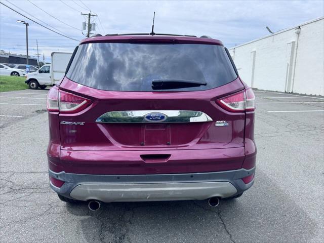 Photo of 2013 Ruby Red Tinted Clearcoat Ford Escape