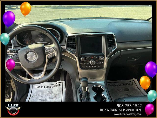 Photo of 2018 Diamond Black Crystal Pearlcoat Jeep Grand Cherokee