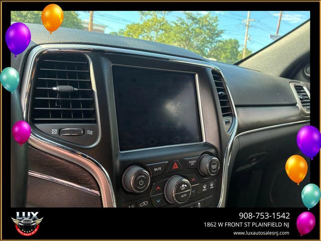 Photo of 2018 Diamond Black Crystal Pearlcoat Jeep Grand Cherokee