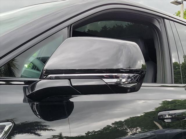 Photo of 2025 Black Raven Cadillac Escalade IQ