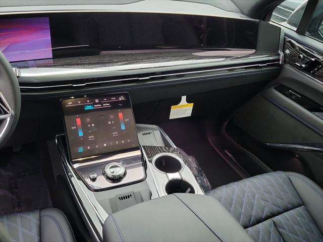 Photo of 2025 Black Raven Cadillac Escalade IQ