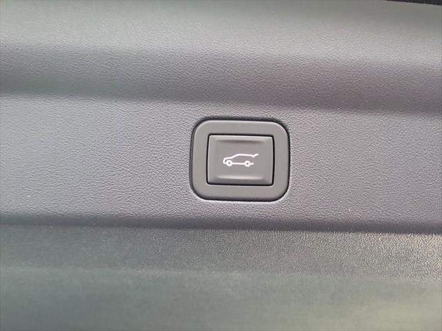 Photo of 2025 Black Raven Cadillac Escalade IQ