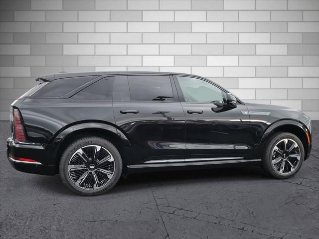 Photo of 2025 Black Raven Cadillac Escalade IQ