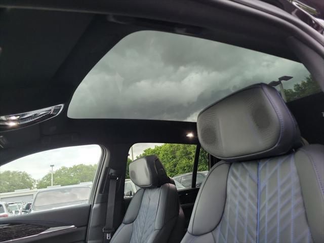 Photo of 2025 Black Raven Cadillac Escalade IQ
